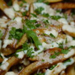 CARTOFI PRĂJIȚI CU PARMEZAN ȘI USTUROI - 200G